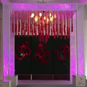 custom fabricated mandap with lighting and flower garlands