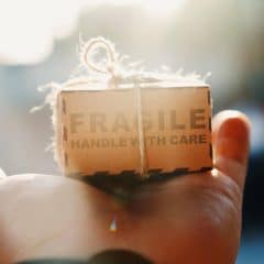 Tiny box With Fragile Handle With Care Written On It. Showcasing How Important It IS To Hire A LED Furniture Rental Company With Delivery Service 