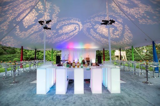 Outdoor event with furniture rentals from Modern Event Rentals.